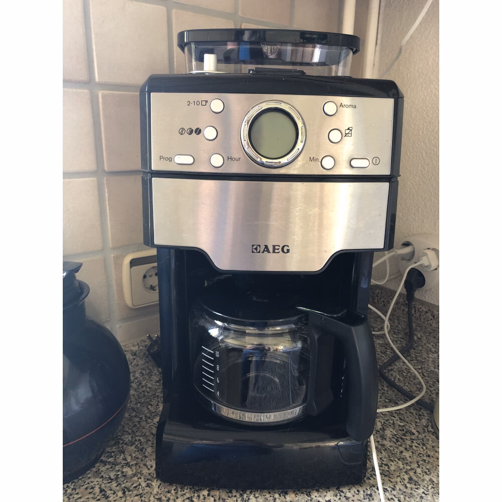 Wie funktioniert eine Kaffeemaschine mit Mahlwerk?