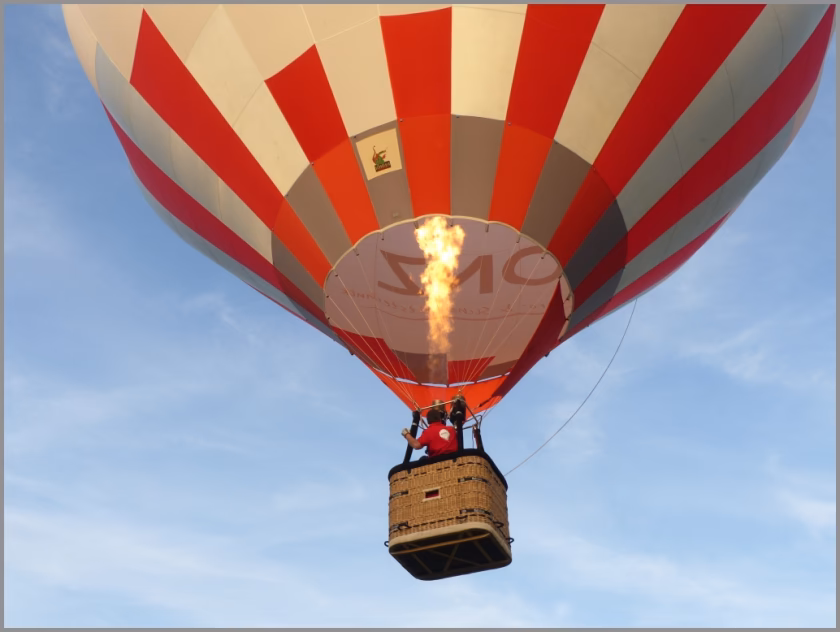 Wie bringt man einen Heißluftballon zum Sinken?